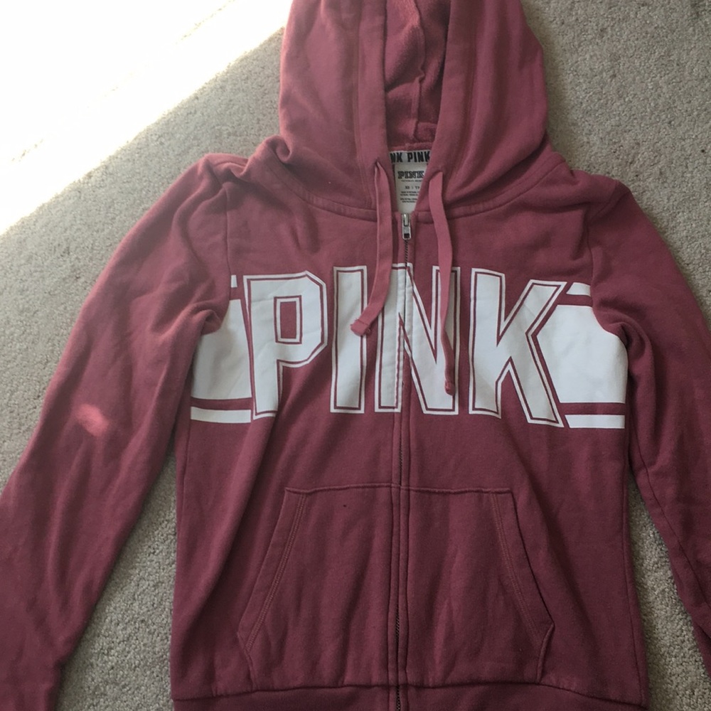pink zip up sweatshirt